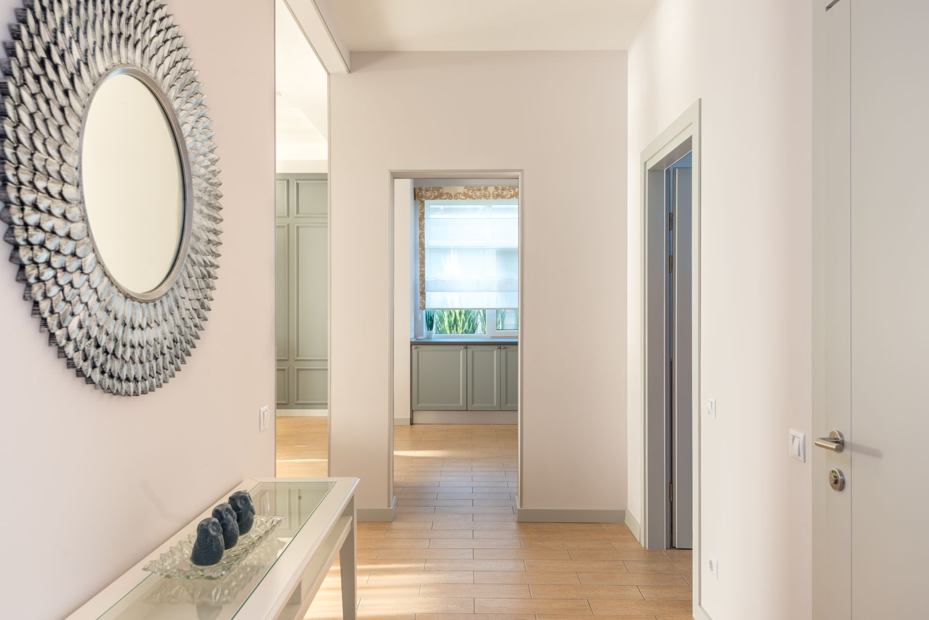 Minimalist interior hallway with wall art and natural light. Modern design, illustrating What Feng Shui Says About the Approach to a House