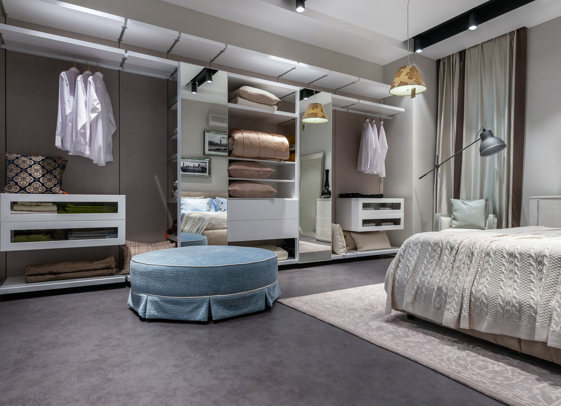 Interior of design of modern bedroom with comfortable bed carpet and built in wardrobe, illustrating What Does Feng Shui Say About Bedroom Door Alignment