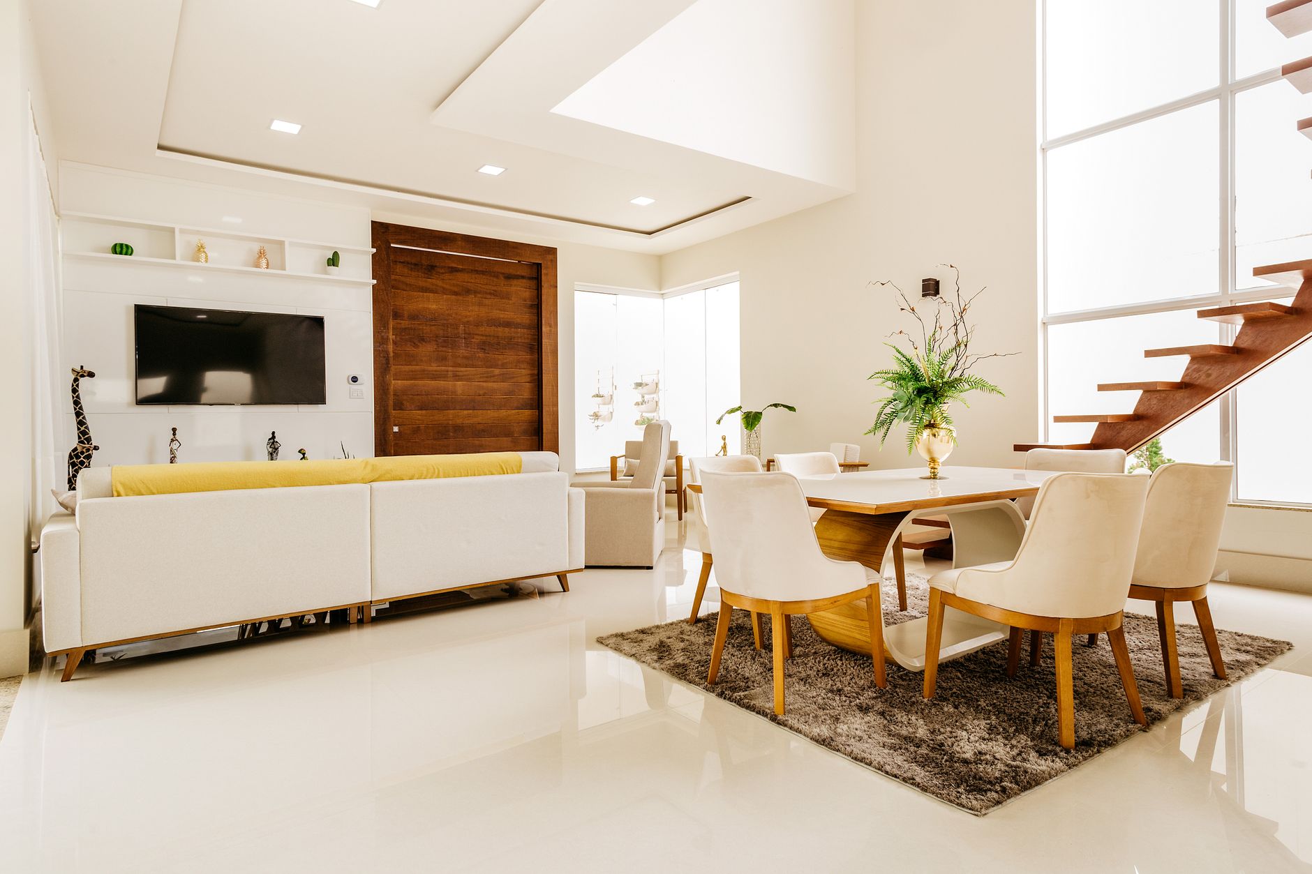 Modern interior of modern living room with second level space in minimalistic design in white color with wooden elements, illustrating Black Sect (BTB) Feng Shui: What It Is, and W