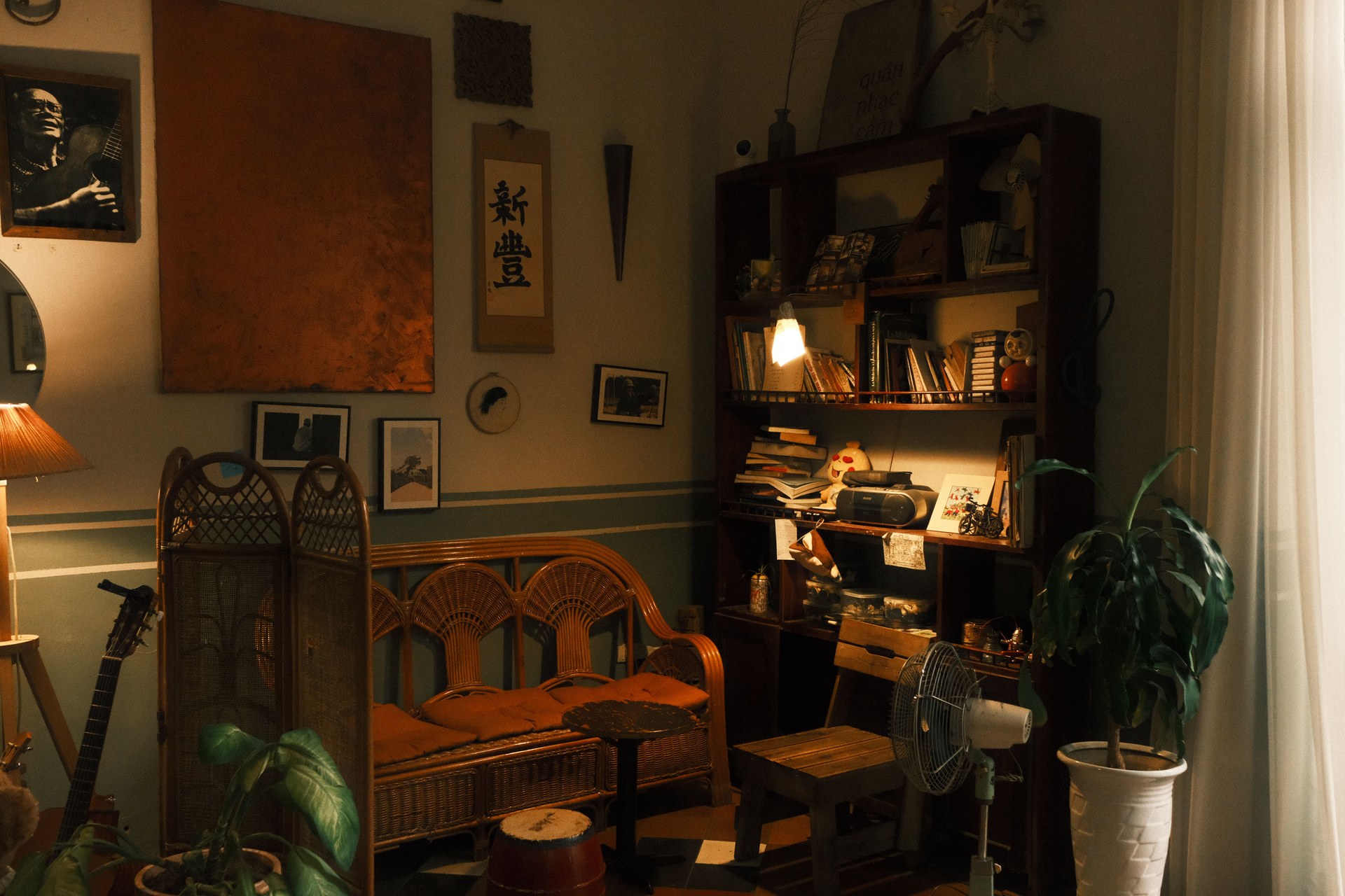 Warm and inviting vintage reading room with bookshelves and natural lighting
