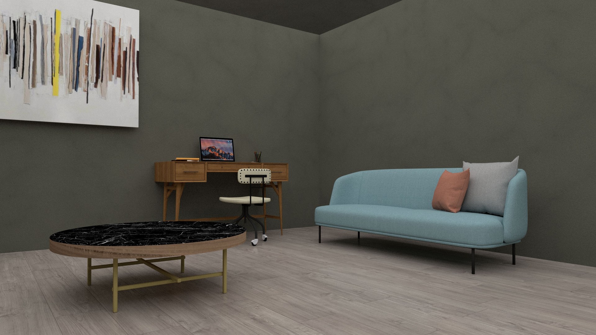 A living room with a sofa and a desk leaving a wide area of clear floor
