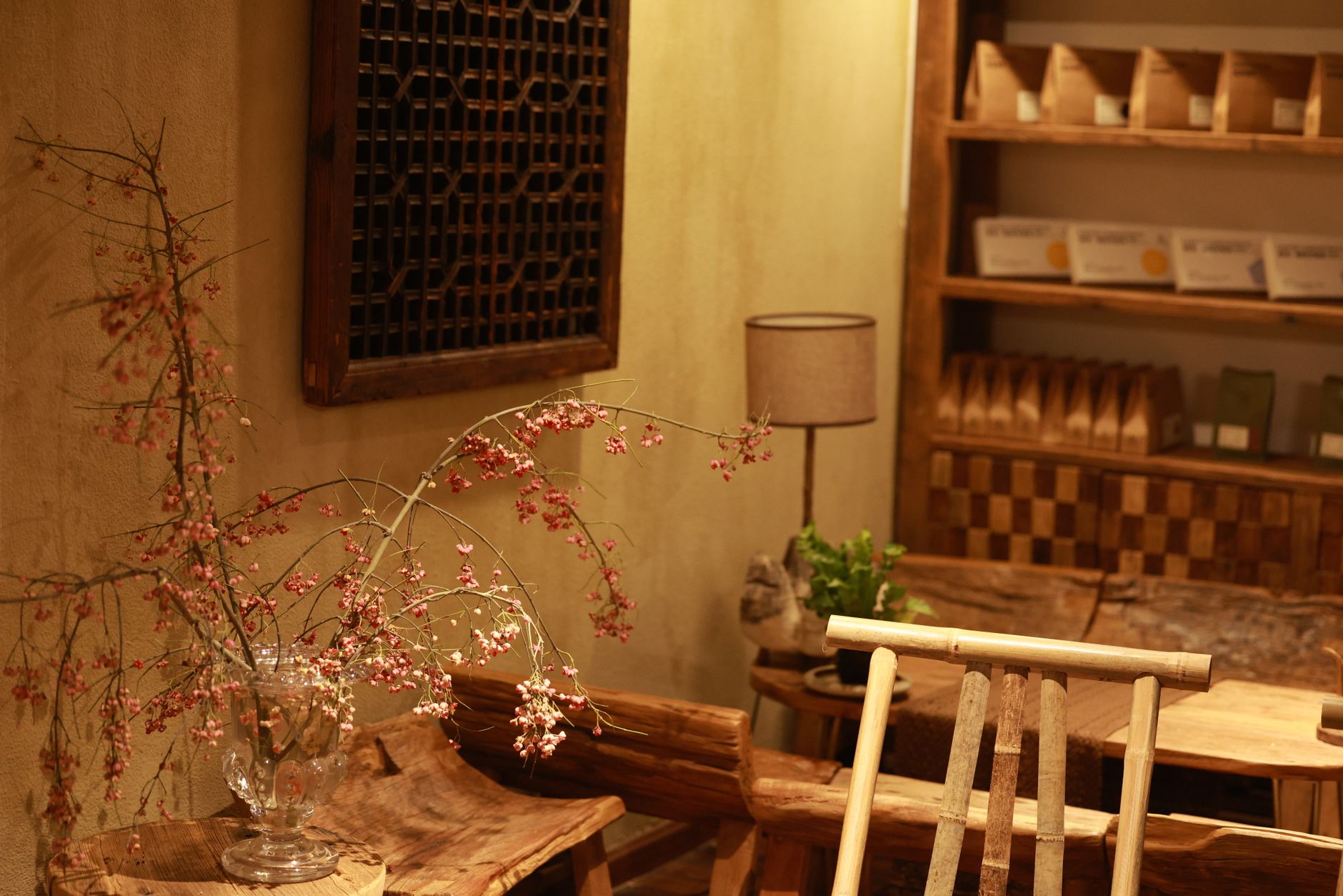Warm and inviting rustic interior featuring floral decor and wooden furniture, illustrating How Do You Orient a Bagua Map to a Home
