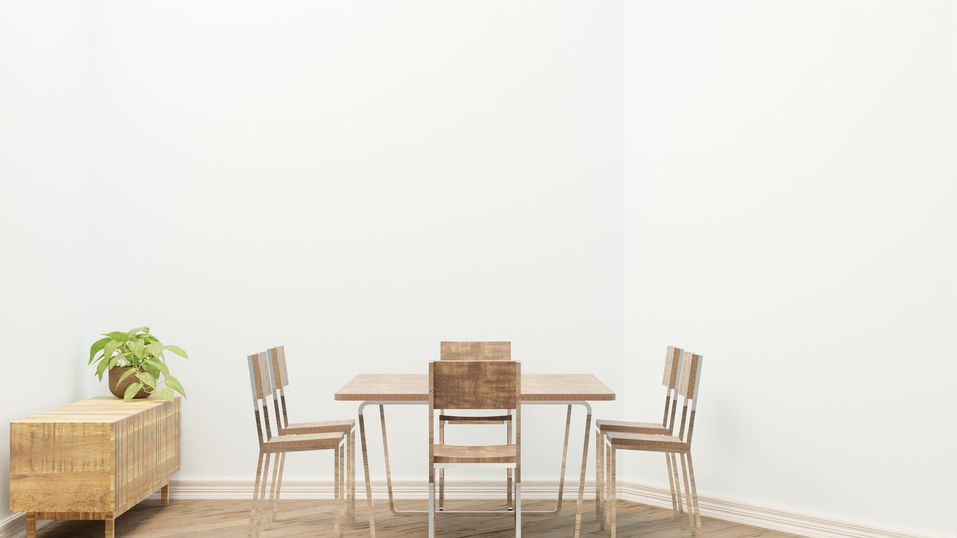 Simple dining room setup featuring wooden table and chairs with a potted plant for decoration