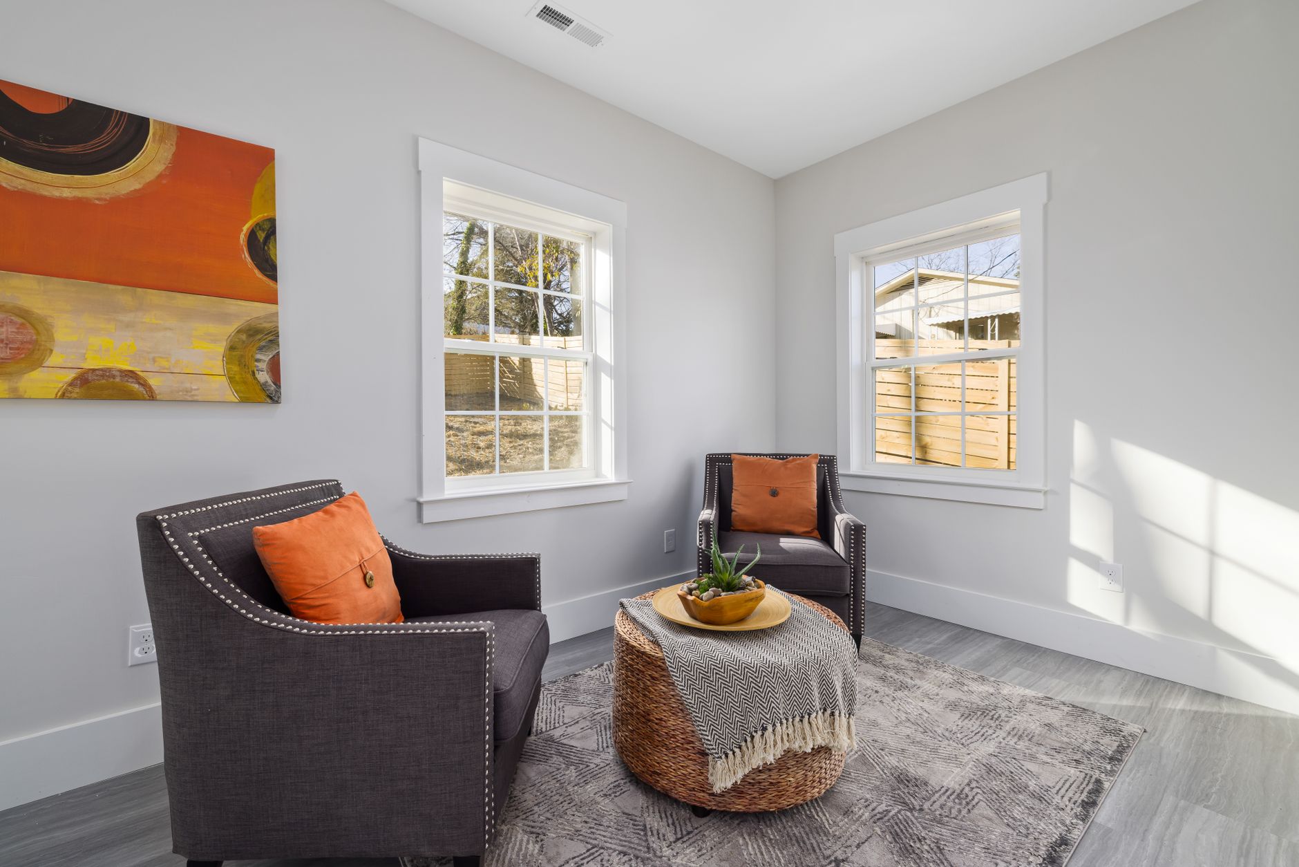 Bright and modern living room with stylish decor and natural lighting. — illustrating What Is the Bagua, and How Is It Actually Used?